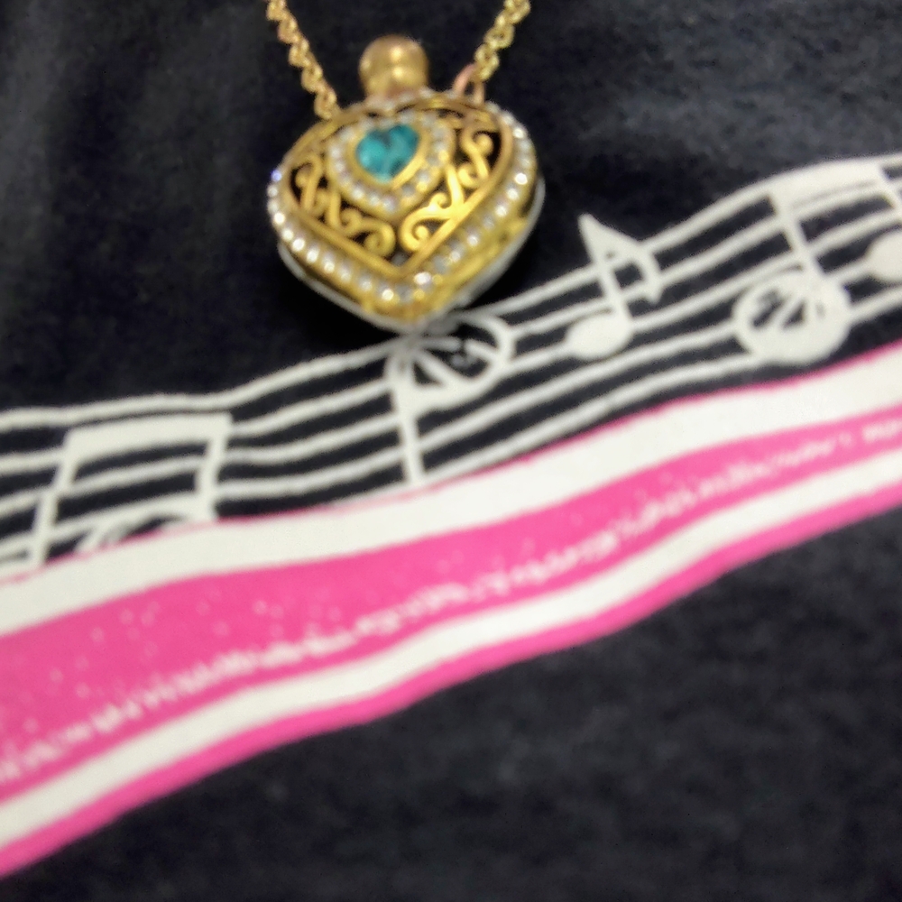 Gold Heart Pendant Necklace with Blue Stone